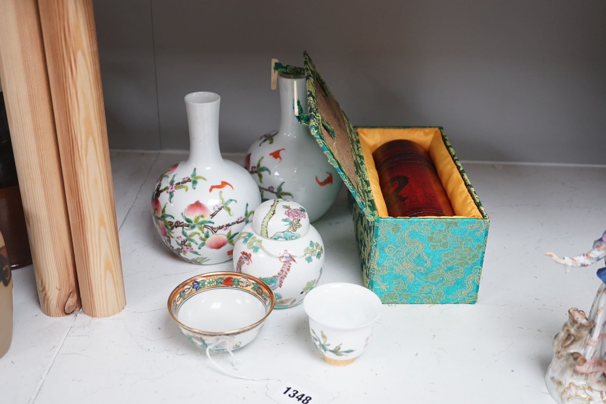 A pair of Chinese famille rose ‘peach’ bottle vases, 17cm, a ‘phoenix’ jar and cover, two porcelain cups and a boxed set of bamboo tallies or counters (6)